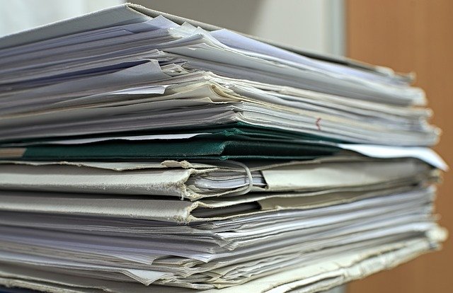 Closing documents stacked together
