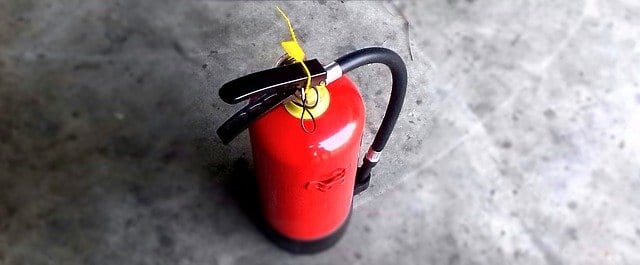 A fire extinguisher not packed during the moving out process