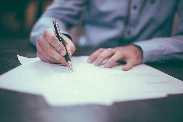 A buyer writing an offer letter to get ahead of his competitors in the real estate market